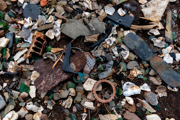 Garbage thrown on the seashore. Environmental pollution concept. Ecological problem.