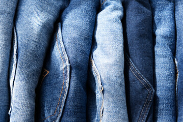 a pile of blue jeans Close up