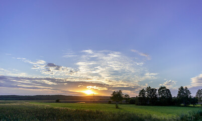 Sunset road. Car travel concept. Nice view from the window.