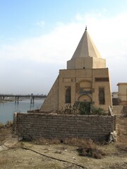 Fototapeta na wymiar Imam Yahya Ebul Kasım Tomb was built in 1239 during the Great Seljuk period. The tomb is located on the banks of the Tigris River. Mosul, Iraq.
