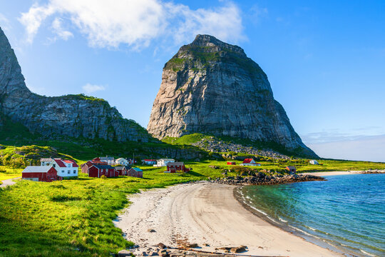 Norwegian island with a mountain peak and a fishing village
