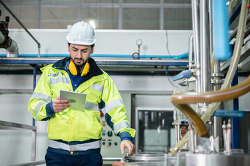 technician inspection engineer working to maintenance a construction equipment industry