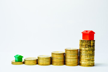 house and coins, gold coins and green and red houses, money, business 