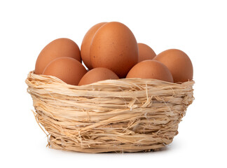 Eggs in basket isolated on white background