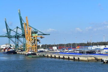 
Some cranes, containers and boats at the dock in Huelva, Spain