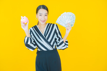 Portrait beautiful young asian woman smile with a lot of cash and money