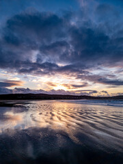 Dramatic sunset at Narin Strand by Portnoo, County Donegal in Ireland.