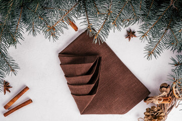 Step-by-step tutorial: Fold linen napkin in shape of Christmas tree. Step 5: Fold one side at angle...