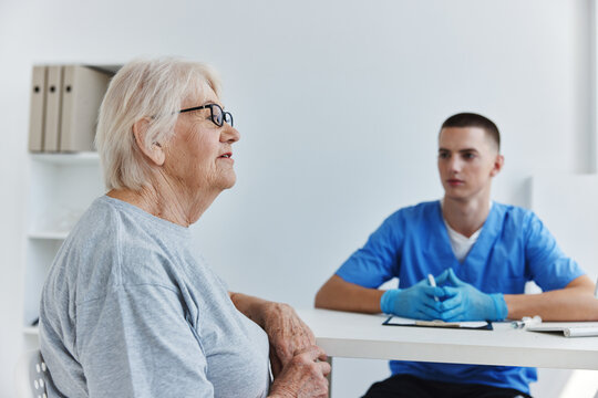 elderly patient talking to the doctor health treatment
