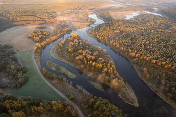 Fototapeta na wymiar Aerial autumn fall sunrise dawn view in Neris regional park, Lithuania