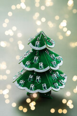 Microchip christmas tree on green background. Holiday banner design. Digital science technology concept. Happy new year, banner. Gift card with green microchip christmas tree.