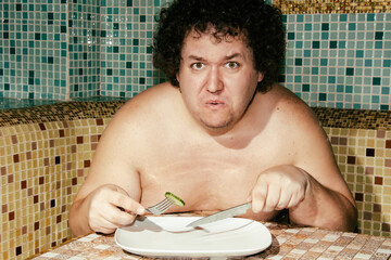 Funny fat man on a diet.