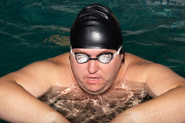 Funny fat guy in the pool.