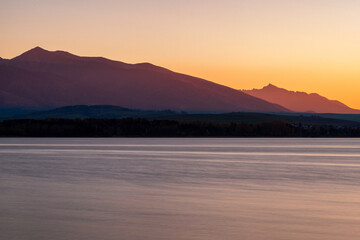 Long exposure of water surface. Tatras mountains at background, Slovakia