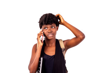 beautiful worried student girl talking on mobile phone.