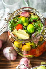 Homemade Preserves. PIckled Tomatoes. Conserve Food in Jar
