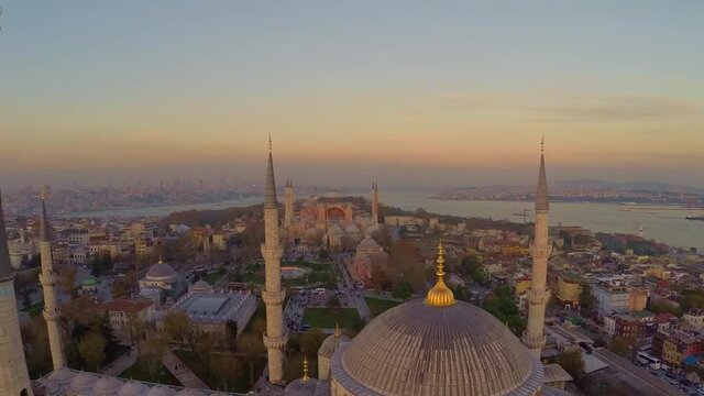 Passing by drone between the minarets of the Istanbul Sultanahmet Mosque towards Hagia Sophia