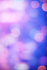 illuminated pink, blue and purple party lights bokeh background