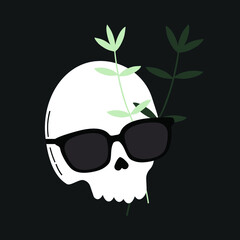 Human skull wearing sunglasses with herbal.