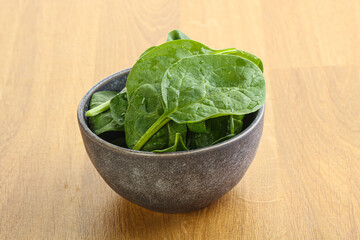 Fresh green spinach leaves in the bowl