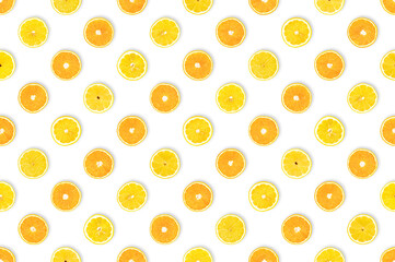 Sweet meets sour: healthy diet concept. Fruit with important nutrients. Pattern of freshly cut lemon and orange slices against white background. Vitamin C background, table top view, flat lay.