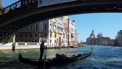 Fototapeta na wymiar Europe, Venice November 2021 - Italy , Venice - Ancient gondolas boats for tourists in the Venice lagoon - Resumption of tourism with the end of the lockdown due Covid-19 Coronavirus - Canal Grande