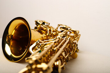 Alto saxophone close-up on white background