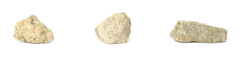 three stones. isolated gray granite stones on white