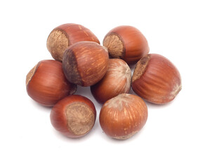 a bunch of hazelnuts isolated on a white background