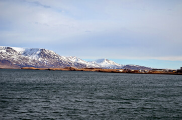 Reykjavik, snow-capped mountains above Faxaflói Bay, Iceland