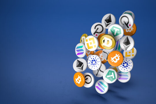 Logos of the main cryptocurrencies Bitcoin, Ethereum, Binance, Cardano, Ripple, Dogecoin, Tether, Solana, Polkadot falling onto a table. Copy space.