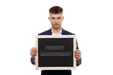 A businessman shows an inscription: PROJECT MANAGEMENT