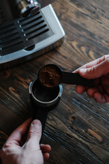 Making coffee at home, espresso machine, table