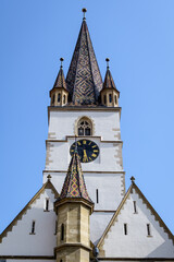 Fototapeta na wymiar Renovated old historical building of Lutheran Cathedral of Saint Mary (Catedrala Evanghelica Sfanta Maria) in the old city center of Sibiu, in Transylvania (Transilvania) region, Romania .