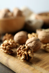 Concept of healthy food with walnuts on wooden table