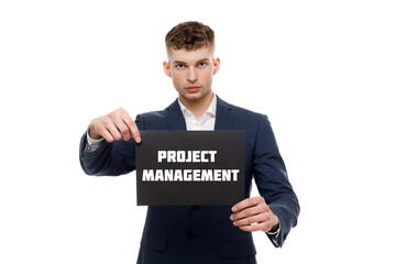 A businessman shows an inscription: PROJECT MANAGEMENT