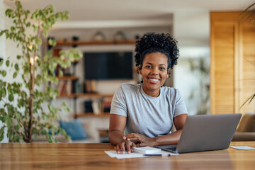Shot of african-american woman, improving her knowledge