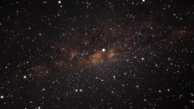 Camera flying through the clouds and star field in outer space. Animation of flying through glowing nebulae and stars. . High quality 4k footage
