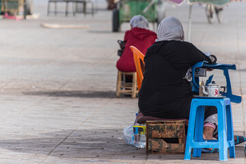 Obraz premium Frauen am Platz der Gehenkten in Marrakesch, Marokko