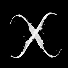 Letter X made of milk splash, isolated on black background