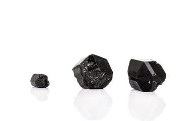 macro mineral stone schorl, black tourmaline on white background