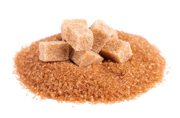 Brown sugar isolated on white background. Heap of cane sugar crystals and sugar cubes.
