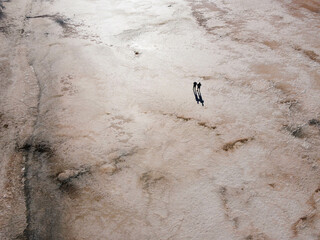 two people on a salt lake