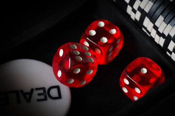 red playing dice, poker plastic chips, close-up, macrophotography, selective focus, blurry background, risk concept, stock exchange game, casino, gambling, gambling, excitement