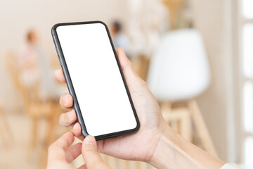 cell phone blank white screen mockup.hand holding texting using mobile on desk at office.background empty space for advertise.work people contact marketing business,technology