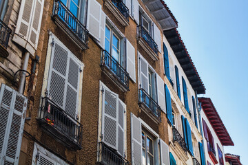 Windows of old buildings in a European city