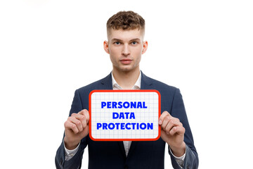 A businessman shows an inscription: PERSONAL DATA PROTECTION