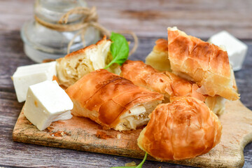 Bakery .Home made  cheese pie  with phyllo pastry and organic eggs. Traditional Bulgarian banitsa with white  feta cheese
