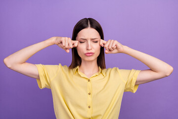 Photo of young girl negative offended crying displeased fail despair isolated over violet color...