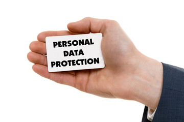 A businessman shows an inscription: PERSONAL DATA PROTECTION